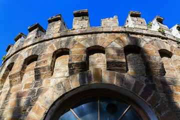 Window in the wall of an old castle.