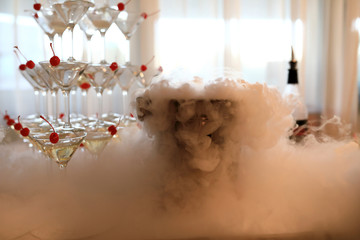 Glasses of champagne with liquid nitrogen