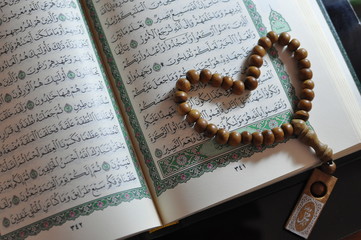 The holy Quran with rosary beads