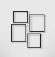 Poster - Empty black frames on a white wall. Vector template