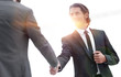 © ASDF - welcome and handshake of business partners