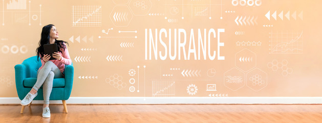 Wall Mural - Insurance with young woman holding a tablet computer in a chair