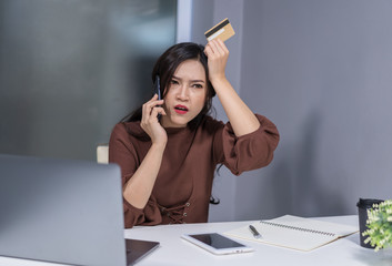 Sticker - stressed woman calling by phone and holdind credit card to online shopping