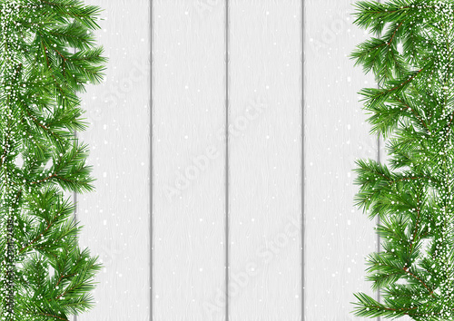 Christmas Snow-covered Branches on a White Wooden Background with Copy Space ...