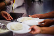 © kuarmungadd - Donate leftover food to hungry people, Concept of poverty and hunger