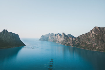 Wall Mural - Mountains and sea fjord landscape in Norway Travel idyllic summer scenery Senja islands aerial view