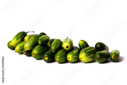Fotografie, Obraz Pointed gourd vegetables on white background