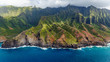 View of the monumental Na Pali Coast at Kaa Alahina Ridge and Manono Ridge, Kalalau trail visible if zoomed in. Aerial shot from a helicopter, Kauai, Hawaii.