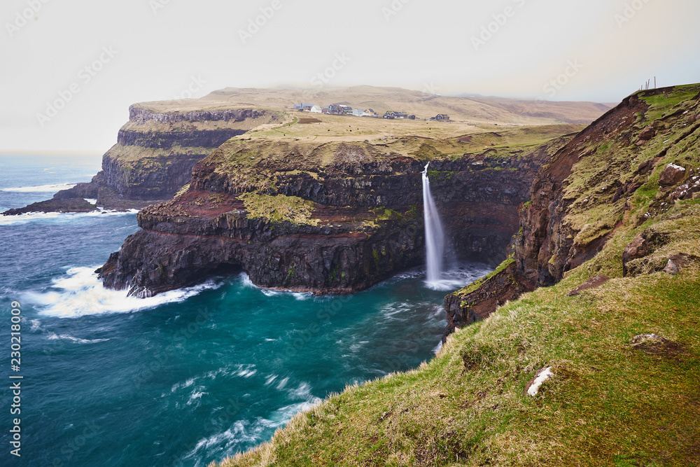 Scenic landscape picture on the vilage Gasadalur on the Vagar island ...