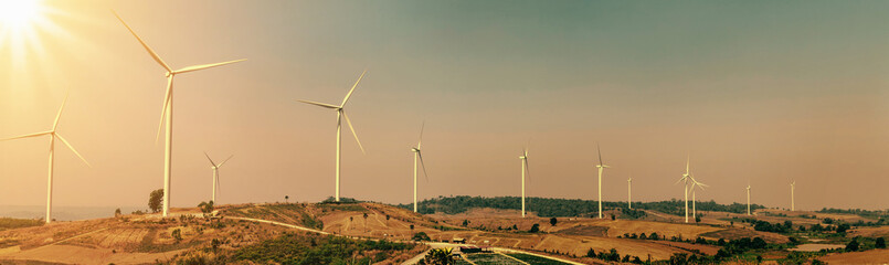 Wall Mural - wind turbine on hill with sunlight. concept eco power energy in nature