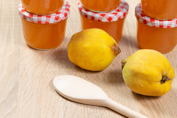 Wall Mural - homemade quince jam in a jar with quinces