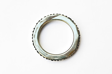 automotive steel gasket for the exhaust system isolated on white background