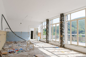 Wall Mural - Abandoned dining room of a restaurant in full morning light