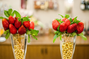 Strawberry decoration on the wineglasses