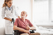 © Yakobchuk Olena - Greatly appreciate your concern. Portrait of smiling young lady in white lab coat taking care of patient