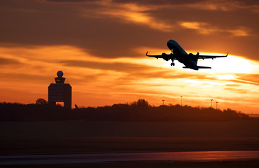 Aircraft early take off at sunrise, Budapest airport