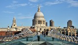 Fototapeta Londyn - The Millennium Bridge in London, which crosses the Thames River and connects St. Paul's Cathedral