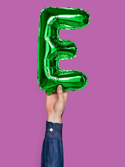 Wall Mural - Hand holding balloon letter E