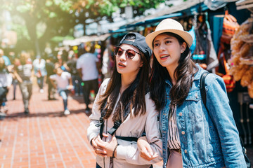 Wall Mural - pretty women standing in the market