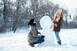 © Tijana - Two young people enjoying in the snow