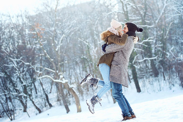 Two young people enjoying in the snow