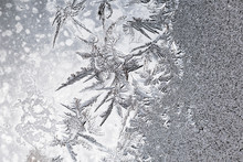 Frozen Iced Background. Ice Pattern On The Glass. Macro Frost Turn Into Negative Black White Photo