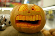 © Dyba Images - Beautiful original carved Halloween pumpkin with big teeth