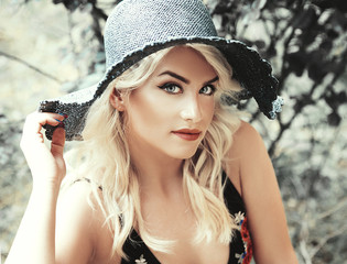 Young woman wearing hat summer portrait