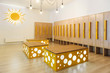 © LIGHTFIELD STUDIOS - wooden lockers in modern illuminated kindergarten cloakroom