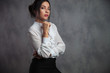 © Viorel Sima - young woman in white shirt and skirt is thinking