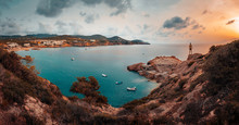 Panoramic On The Island Of Ibiza And Its Cliffs In An Afternoon Of Contrasts And Clouds