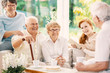 © Photographee.eu - Happy elderly people drinking tea in the common room of nursing house