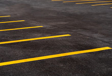 Parking Lot For Motorcycle And Bicycle With Yellow Line Background. Asphalt Road