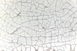 Background of broken cracked white paint 