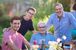 © jackfrog - During a family picnic. Portrait of three generation of men