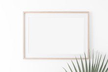Landscape Large 50x70, 20x28, A3,a4, Wooden Frame Mockup With Passe-partout On White Wall And Palm Leaf. Poster Mockup. Clean, Modern, Minimal Frame. Empty Fra.me Indoor Interior, Show Text Or Product