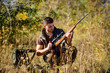 © be free - Hunting shooting trophy. Hunting hobby and leisure. Man charging hunting rifle. Hunting equipment concept. Hunter with rifle looking for animal. Hunter khaki clothes ready to hunt nature background
