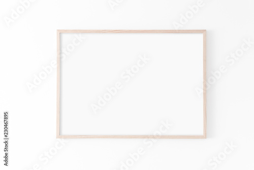 Landscape large 50x70, 20x28, a3,a4, Wooden frame mockup on white wall. Poster mockup. Clean, modern, minimal frame. Empty fra.me Indoor interior, show text or product