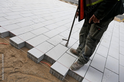 Fotografie, Obraz New paving stones on the sidewalk, close-up