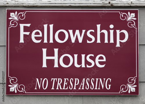 Fotografie, Tablou Fellowship House sign with humorous ironic tag mounted on wall.
