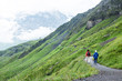 © Rick Lohre - Hikers on trail near Kleine Scheidegg, Grindelwald, Bernese Oberland, Switzerland, Europe