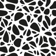 Seamless pattern. Abstract black and white background. Spiderweb mesh or coquina imitation. 