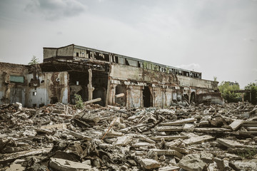 earthquake or war aftermath or hurricane or other natural disaster, broken ruined buildings, pills o