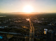 Aerial drone photo - Highways of Denver Colorado leading to the Rocky Mountains at Sunset