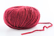 © smspsy - Ball of red wool yarn isolated on white