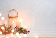 Christmas Background, Burning Lantern Candles Decorated With Frosted Fir Branches