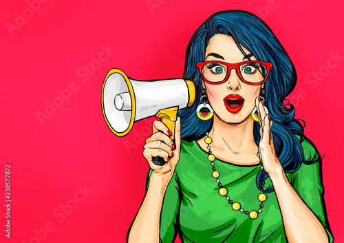 Photo  Amazed Pop art girl in glasses with megaphone saying something