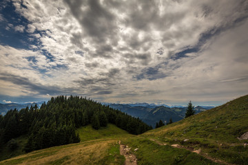 Wall Mural - Mountain landscape with hiking trail and view of beautiful landscape. Salzkammergut region, Schafberg, Austria.