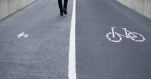 Street Divided In Pedestrian Footpath And Bike Lane
