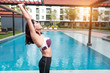 © feeling lucky - young healthy and sporty woman do yoga stretching outdoor (this image for workout and training concept)